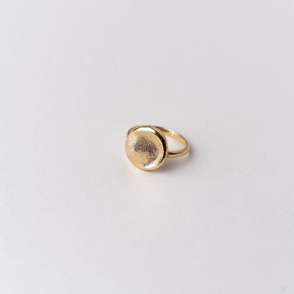 A ROHO Heritage Jewellery fingerprint impression ring in yellow gold, displayed on a clean white background.